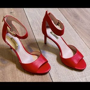 Ruby calf sandal. Aspen calf leather with gold buckle.